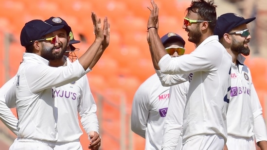 Indian bowler Axar Patel (R) celebrates with teammates(PTI) Indian bowler Axar Patel (R) celebrates with teammates(PTI)