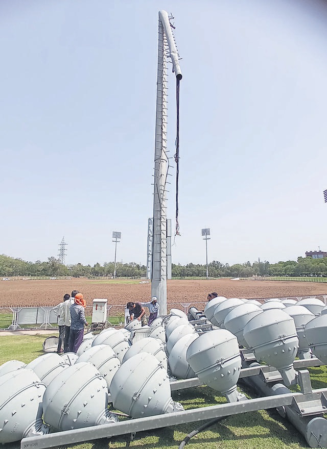 The fallen floodlights at the cricket ground of Tau Devi Lal Sports Stadium in Panchkula. (Sant Arora/HT) The fallen floodlights at the cricket ground of Tau Devi Lal Sports Stadium in Panchkula. (Sant Arora/HT)