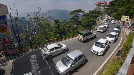Vehicles stuck in a traffic jam on the first day of the unlocking process after easing of Covid-19 restrictions in Shimla on May 31. Meanwhile, recoveries from the illness have continued to outnumber the daily new cases for the 18th consecutive day now.(PTI)