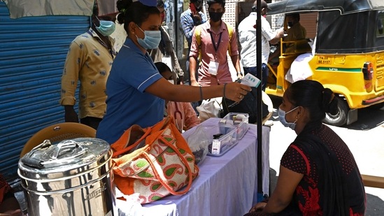 Chennai's overall Covid-19 tally is 504,502 cases, with the active cases, those under treatment remaining at 33,922. In picture - A health worker checks the body temperature at a Covid-19 camp in Chennai. (AFP) Chennai's overall Covid-19 tally is 504,502 cases, with the active cases, those under treatment remaining at 33,922. In picture - A health worker checks the body temperature at a Covid-19 camp in Chennai. (AFP)