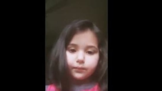 The six-year-old girl is seen complaining about the load of her school work in the viral video.(Screengrab/Twitter)