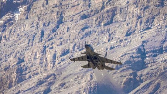An Indian Air Force fighter jet flies in the backdrop of Himalayan mountain ranges, amid de-escalation efforts by India and China in eastern Ladakh, in Leh. (PTI) An Indian Air Force fighter jet flies in the backdrop of Himalayan mountain ranges, amid de-escalation efforts by India and China in eastern Ladakh, in Leh. (PTI)
