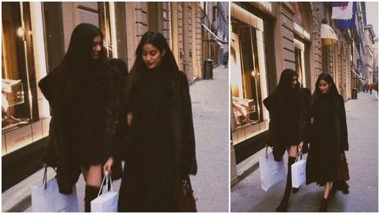 In this still, the duo can be seen twinning in all-black outfits. Janhvi donned a long black dress which she teamed with a black coat and ankle-length boots. Khushi, on the other hand, styled her little black dress with an oversized jacket and thigh-high boots.(Instagram/khushi05k)