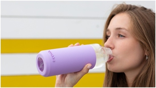 Drink plenty of water: Keep your body hydrated by drinking a lot of fluids. This will ease water retention and keep you away from bloating.(Unsplash)