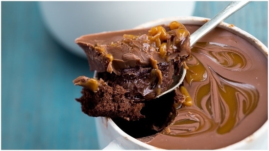 Chocolate hazelnut mug cake (2 servings): Take 1 cup chocolate hazelnut spread, 2 large eggs in a bowl and mix well. Add 1/4 cup all-purpose flour and stir again. Evenly distribute into two mugs. Microwave it for 2 minutes, take it out and let it cool before taking a bite.(Unsplash)