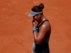 Japan's Naomi Osaka reacts during her first-round match against Romania's Patricia Maria
