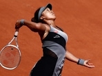 Japan's Naomi Osaka in action during her first round match against Romania's Patricia Maria Tig