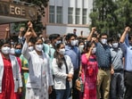 The association, comprising around 3,000 members from six medical colleges in the state, has demanded that beds for junior doctors serving Covid-19 patients be reserved in separate areas in case they contract the infection. In picture - Protest at Gandhi Medical College in Bhopal.(PTI) The association, comprising around 3,000 members from six medical colleges in the state, has demanded that beds for junior doctors serving Covid-19 patients be reserved in separate areas in case they contract the infection. In picture - Protest at Gandhi Medical College in Bhopal.(PTI)