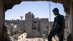 Mahmoud Al-Masri, 14, stands for a portrait in his bedroom that was damaged when an airstrike destroyed the neighboring building prior to a cease-fire that halted an 11-day war between Hamas and Israel, on May 26 in Beit Hanoun, Gaza Strip. Mahmoud Al-Masri, 14, stands for a portrait in his bedroom that was damaged when an airstrike destroyed the neighboring building prior to a cease-fire that halted an 11-day war between Hamas and Israel, on May 26 in Beit Hanoun, Gaza Strip.