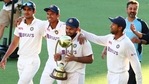 India's Rishabh Pant carries the trophy as he celebrates with his teammates after defeating Australia(AP) India's Rishabh Pant carries the trophy as he celebrates with his teammates after defeating Australia(AP)