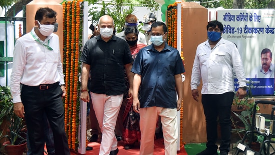 Delhi Chief Minister Arvind Kejriwal along with Delhi Deputy CM Manish Sisodia during the inauguration of the vaccination centre for media persons in New Delhi on Monday. (ANI Photo) Delhi Chief Minister Arvind Kejriwal along with Delhi Deputy CM Manish Sisodia during the inauguration of the vaccination centre for media persons in New Delhi on Monday. (ANI Photo)