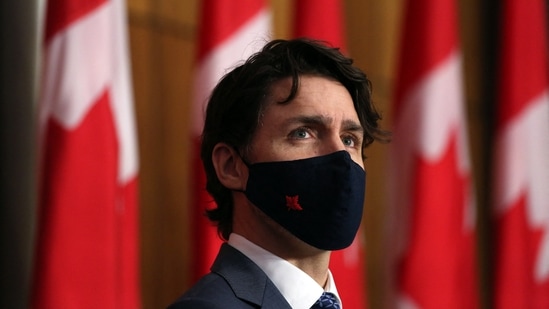 Canadian Prime Minister Justin Trudeau listens to a reporter's question during a news conference in Ottawa, Canada.(AFP)