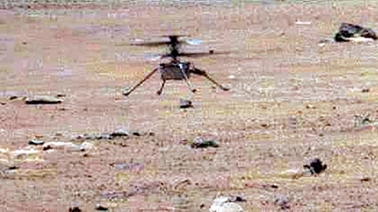 This photo shows Nasa's Ingenuity Mars Helicopter as it lands with a soft bounce after its fifth flight, captured by the Mastcam-Z imager aboard Nasa Perseverance rover.(NASA/JPL-Caltech/ASU/MSSS)