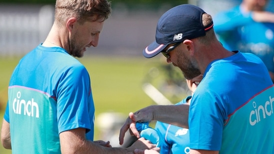 England's Joe Root (L) has his hand looked at after taking a blow during a training session at Lord's Cricket Ground in London on May 31, 2021 ahead of the first Test match between England and New Zealand on June 2. (AFP) England's Joe Root (L) has his hand looked at after taking a blow during a training session at Lord's Cricket Ground in London on May 31, 2021 ahead of the first Test match between England and New Zealand on June 2. (AFP)