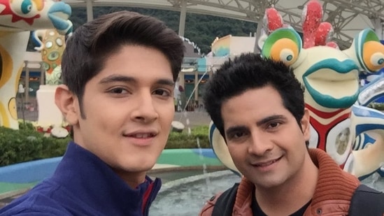 Rohan Mehra and Karan Mehra pose together. 