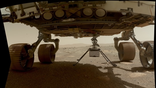 NASA's Ingenuity helicopter can be seen here with all four of its legs deployed before dropping from the belly of the Perseverance rover on March 30, 2021, the 39th Martian day, or sol, of the mission.(NASA/JPL-Caltech/MSSS)