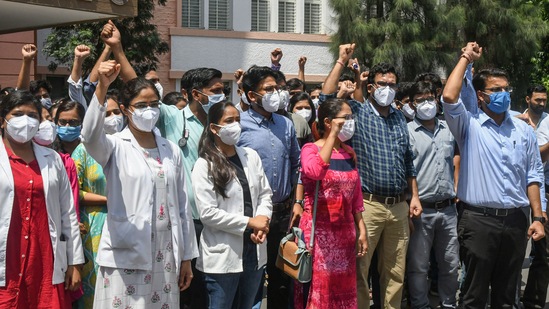 The association, comprising around 3,000 members from six medical colleges in the state, has demanded that beds for junior doctors serving Covid-19 patients be reserved in separate areas in case they contract the infection. In picture - Protest at Gandhi Medical College in Bhopal. (PTI) The association, comprising around 3,000 members from six medical colleges in the state, has demanded that beds for junior doctors serving Covid-19 patients be reserved in separate areas in case they contract the infection. In picture - Protest at Gandhi Medical College in Bhopal. (PTI)