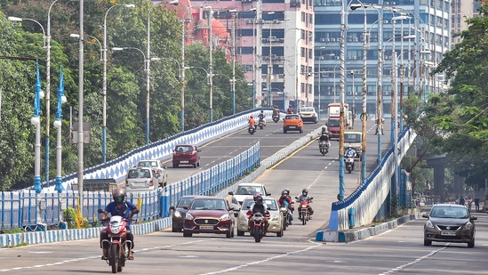 Vehicles on a flyover after easing of restrictions of Covid-19 lockdown, in Kolkata on Tuesday. (PTI Photo) Vehicles on a flyover after easing of restrictions of Covid-19 lockdown, in Kolkata on Tuesday. (PTI Photo)