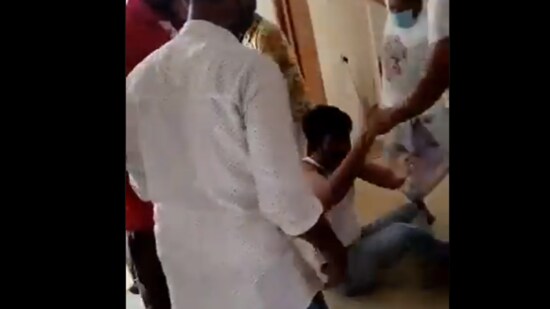 A video of the incident in which a group of persons is seen hitting the doctor with broom, utensils and kicking him while he lay on the ground has gone viral on social media platforms. (Video screengrab)