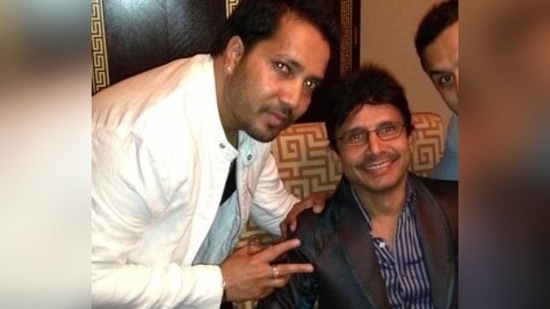 Kamaal R Khan poses with Mika Singh.