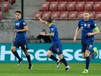 FILE PHOTO: Slovakia's David Strelec celebrates scoring their first goal with teammates.