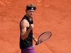 Germany's Alexander Zverev celebrates after winning a point against Russia's Roman Safiullin during their second-round match on day four of the French Open.