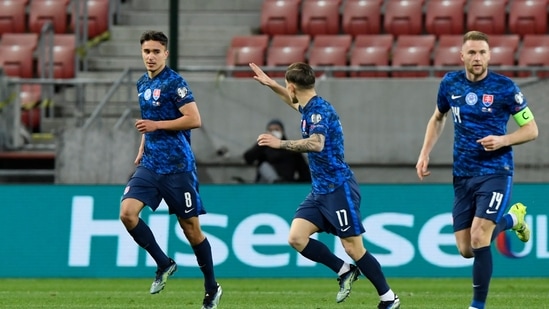 FILE PHOTO: Slovakia's David Strelec celebrates scoring their first goal with teammates.(REUTERS)