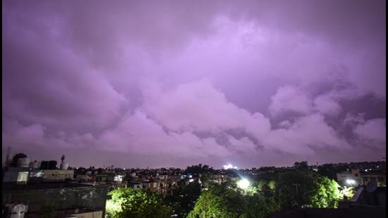 Lightning and an overcast sky during overnight rain and thunderstorm, seen from Patel Nagar in New Delhi on Tuesday, June 1. (Sanchit Khanna/HT photo) Lightning and an overcast sky during overnight rain and thunderstorm, seen from Patel Nagar in New Delhi on Tuesday, June 1. (Sanchit Khanna/HT photo)