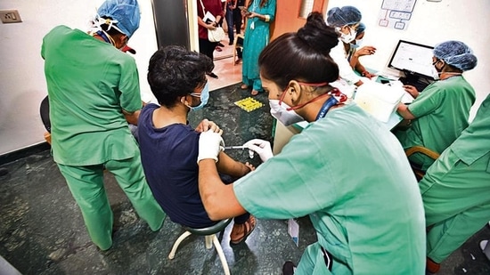 A person gets vaccinated at a Centre in New Delhi (HT Photo) A person gets vaccinated at a Centre in New Delhi (HT Photo)