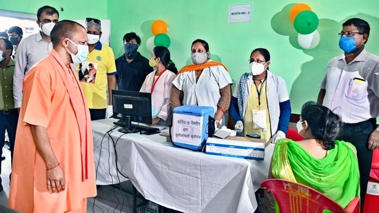 Uttar Pradesh chief minister Yogi Adityanath interacts with healthcare workers at the launch of a free Covid-19 vaccination campaign in Lucknow, on Tuesday. (PTI Photo) Uttar Pradesh chief minister Yogi Adityanath interacts with healthcare workers at the launch of a free Covid-19 vaccination campaign in Lucknow, on Tuesday. (PTI Photo)
