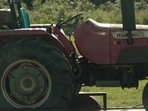 The image shows the scene featuring Mahindra tractor from the Oscar winning movie.(Screengrab) The image shows the scene featuring Mahindra tractor from the Oscar winning movie.(Screengrab)