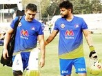 CSK skipper MS Dhoni (L) with batsman Suresh Raina (R)(Suresh Raina / Twitter)