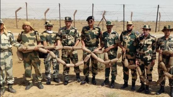 BSF recovered 54 packets of suspected Heroin, weighing over 56 kgs approximately, from border along Pakistan.