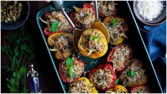 Quinoa stuffed bell peppers: Preheat the oven. To make this, you will need some bell peppers, green chillies, lemon juice, roasted chickpeas, cilantro, spices and olive oil. Mix all the ingredients, stuff it in the quinoa, top it with some cheese and put it in the oven. Cook for 45 minutes and serve hot. (Instagram/simranskitchenoman)
