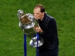 Chelsea manager Thomas Tuchel celebrates with the trophy.