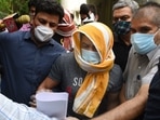 Olympic wrestler Sushil Kumar and his associate Ajay Kumar (back) in the custody of Delhi Police in New Delhi. (Arvind Yadav/ Hindustan Times) Olympic wrestler Sushil Kumar and his associate Ajay Kumar (back) in the custody of Delhi Police in New Delhi. (Arvind Yadav/ Hindustan Times)