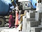 Labourers seen at Man Singh Road after the Delhi Govt announced a partial unlock from a Covid-19 lockdown for factories and construction sites, in New Delhi. Labourers seen at Man Singh Road after the Delhi Govt announced a partial unlock from a Covid-19 lockdown for factories and construction sites, in New Delhi.