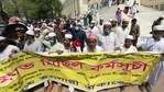 Bangladeshi demonstrators were also seen wearing blue masks to highlight gross human rights violations. Bangladeshi demonstrators were also seen wearing blue masks to highlight gross human rights violations.