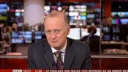 The image shows the news presenter in question.