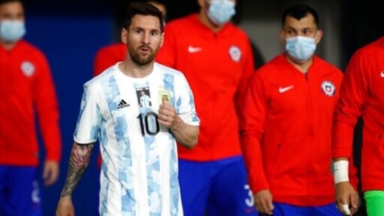 Argentina's Lionel Messi wears a jersey with football star Diego Maradona's number.(AP)