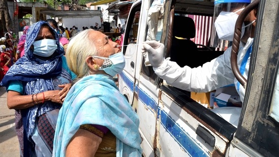 Representational: A health worker collects a nasal sample of an elderly woman for the Covid-19 testing. (ANI Photo) Representational: A health worker collects a nasal sample of an elderly woman for the Covid-19 testing. (ANI Photo)