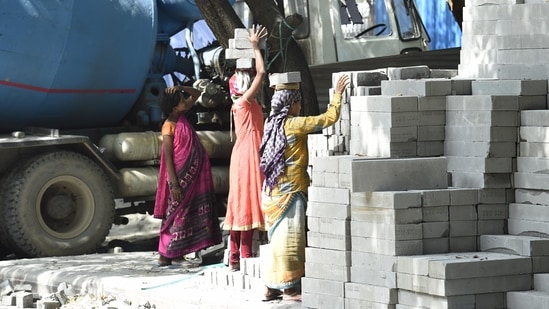 Labourers seen at Man Singh Road after the Delhi Govt announced a partial unlock from a Covid-19 lockdown for factories and construction sites, in New Delhi. (Arvind Yadav/ Hindustan Times) Labourers seen at Man Singh Road after the Delhi Govt announced a partial unlock from a Covid-19 lockdown for factories and construction sites, in New Delhi. (Arvind Yadav/ Hindustan Times)