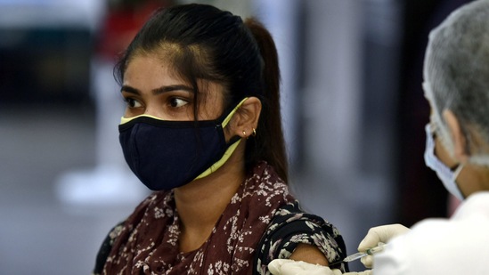 A health worker administers a Covid-19 vaccine at sector 30 district hospital, in Noida, India, on Thursday, June 03, 2021 (Sunil Ghosh / Hindustan Times). A health worker administers a Covid-19 vaccine at sector 30 district hospital, in Noida, India, on Thursday, June 03, 2021 (Sunil Ghosh / Hindustan Times).