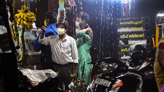 People take shelter during rainfall in Thiruvananthapuram, on June 3. IMD said over 60% of Kerala’s 14 key rainfall monitoring stations reported 2.5 mm or more rainfall over the last two days. It said the spatial rain distribution in Kerala remained fairly widespread during the same time, HT reported. (PTI) People take shelter during rainfall in Thiruvananthapuram, on June 3. IMD said over 60% of Kerala’s 14 key rainfall monitoring stations reported 2.5 mm or more rainfall over the last two days. It said the spatial rain distribution in Kerala remained fairly widespread during the same time, HT reported. (PTI)