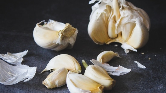 Garlic: Boost your immune system by having more garlic. It has antibacterial and antifungal properties which help kill bacteria.(Unsplash)