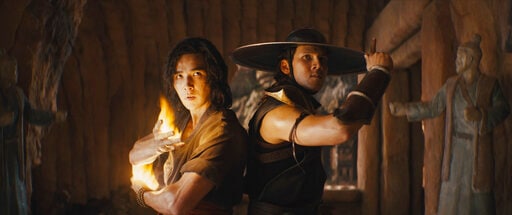 This image released by Warner Bros. Pictures shows Ludi Lin, left, and Max Huang in a scene from Mortal Kombat.(AP)