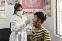 A health worker in PPE coveralls collects a swab sample from a factory worker for Covid-19 test, at Naraina, in New Delhi. (Sanchit Khanna/ Hindustan Times) A health worker in PPE coveralls collects a swab sample from a factory worker for Covid-19 test, at Naraina, in New Delhi. (Sanchit Khanna/ Hindustan Times)