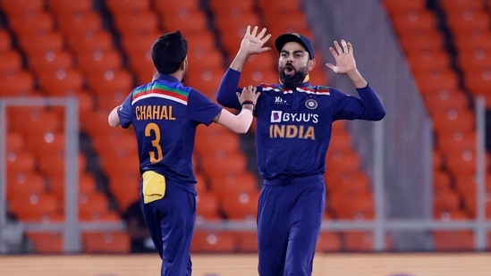 Virat Kohli and Yuzvendra Chahal in action during the England series at home.