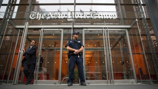 In this June 28, 2018, file photo, a police officer stands outside The New York Times building in New York. The Trump Justice Department secretly obtained the phone records of four New York Times journalists as part of a leak investigation, the newspaper said on Wednesday, (AP Photo) In this June 28, 2018, file photo, a police officer stands outside The New York Times building in New York. The Trump Justice Department secretly obtained the phone records of four New York Times journalists as part of a leak investigation, the newspaper said on Wednesday, (AP Photo)