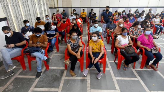 Mumbai: Beneficiaries in the 18-44 age group wait to get vaccinated against Covid-19 at a vaccination centre in Malad East. (Vijay Bate / HT Photo)